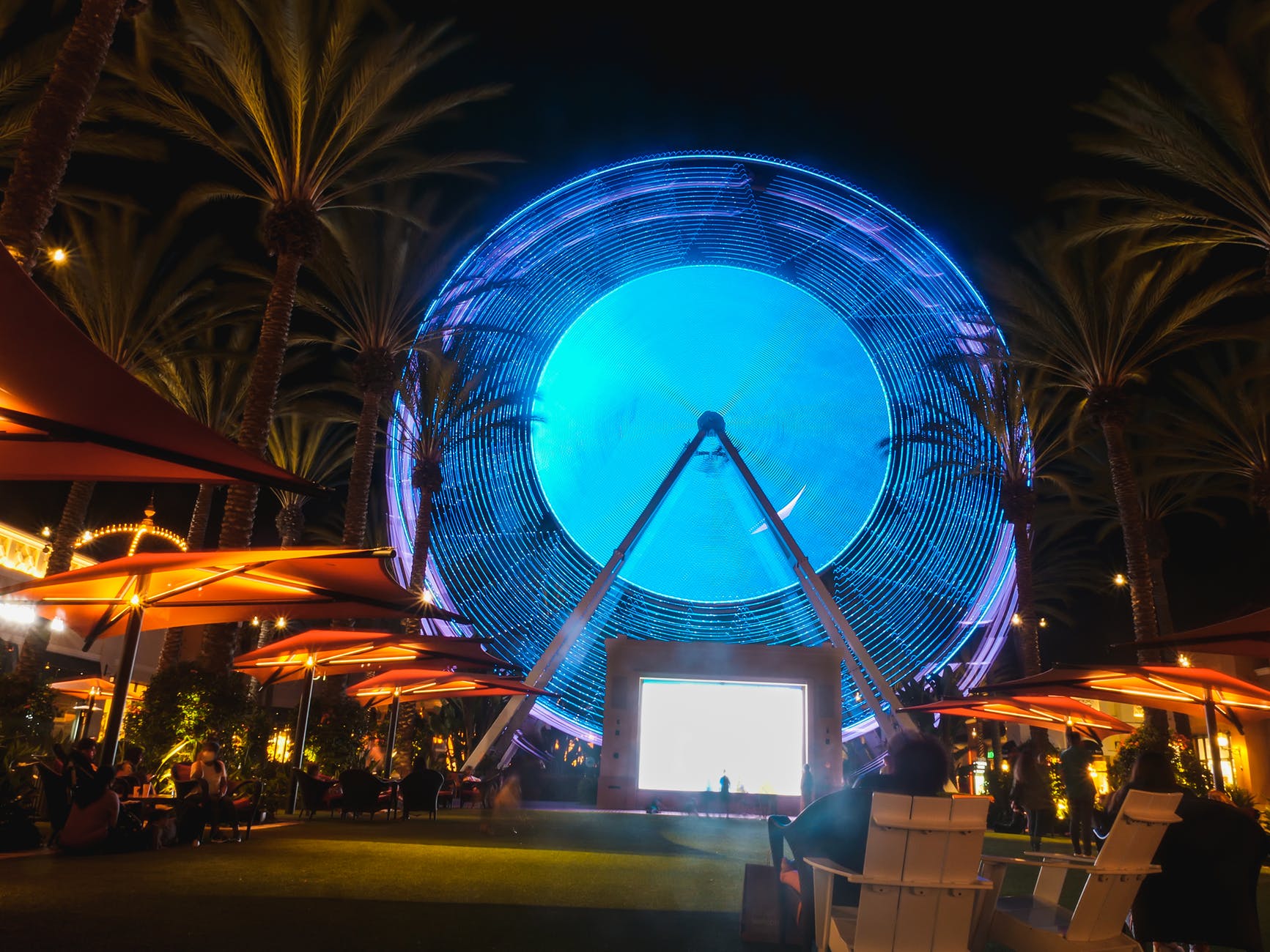 a colorful ferris wheel during night time